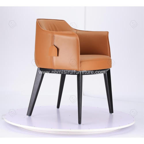 Italian minimalist orange leather single Archibald chairs